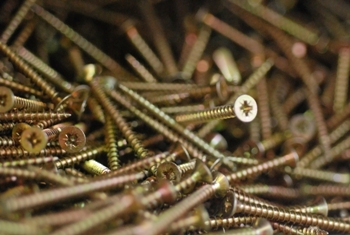 This photo of a bundle of screws - representative of real old-fashioned Hardware - was taken by Polish photographer Kriss Szkurlatowski. 